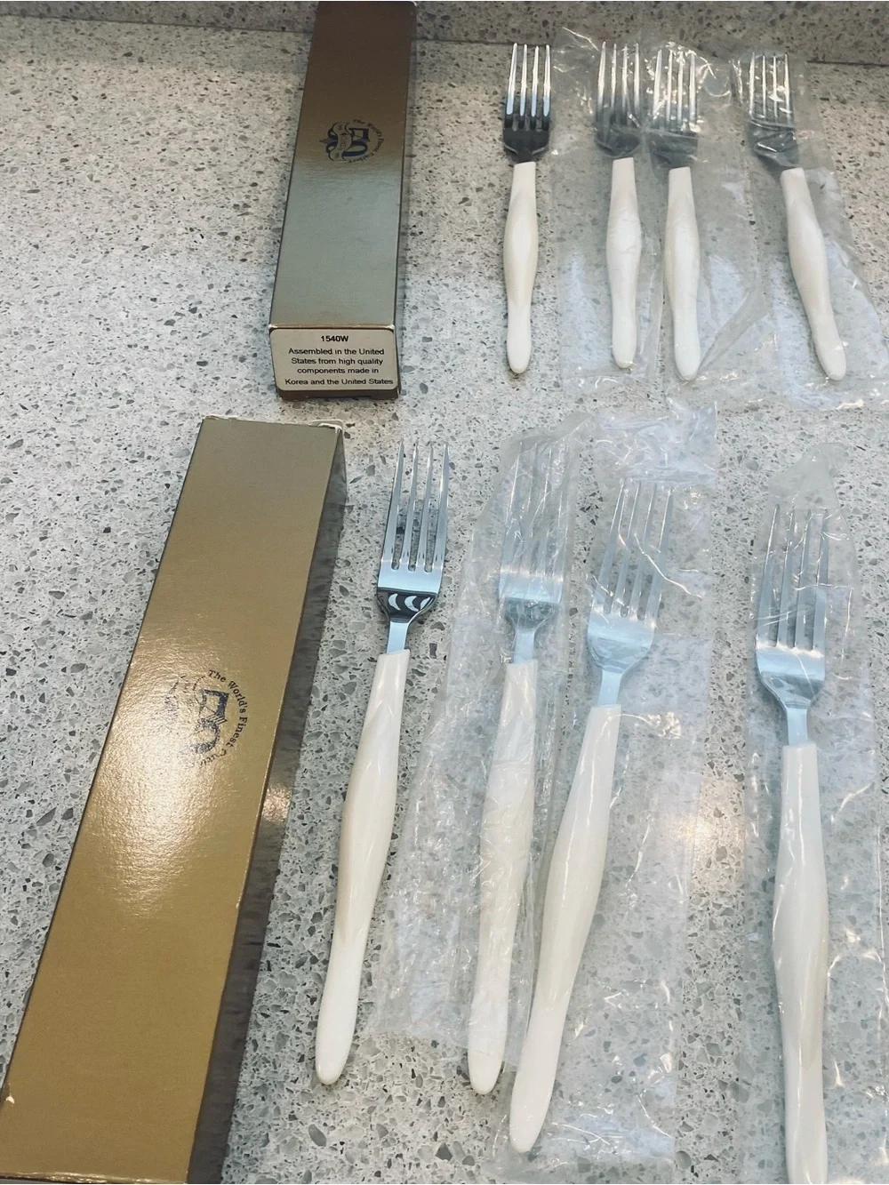 8 dinner forks, 4 salad forks, 8 soup spoons, and 4 tablespoons.